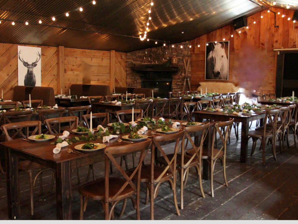 a kitchen with a dining table