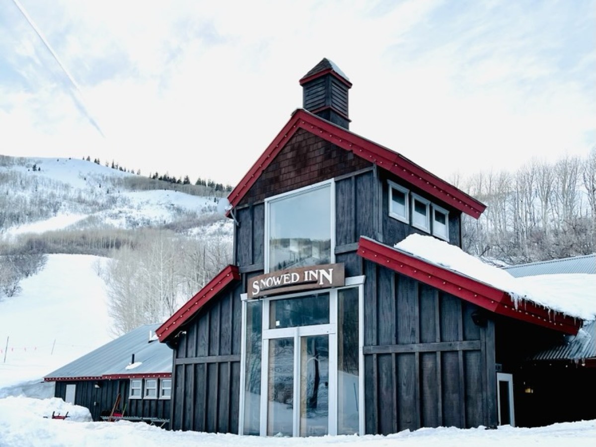 a house covered in snow