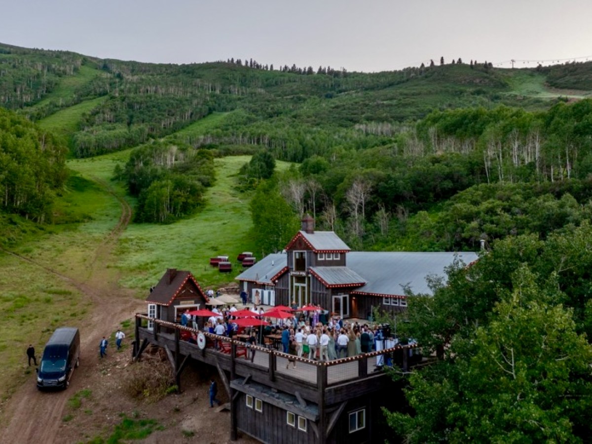 aerial shot of a event space on a mountain